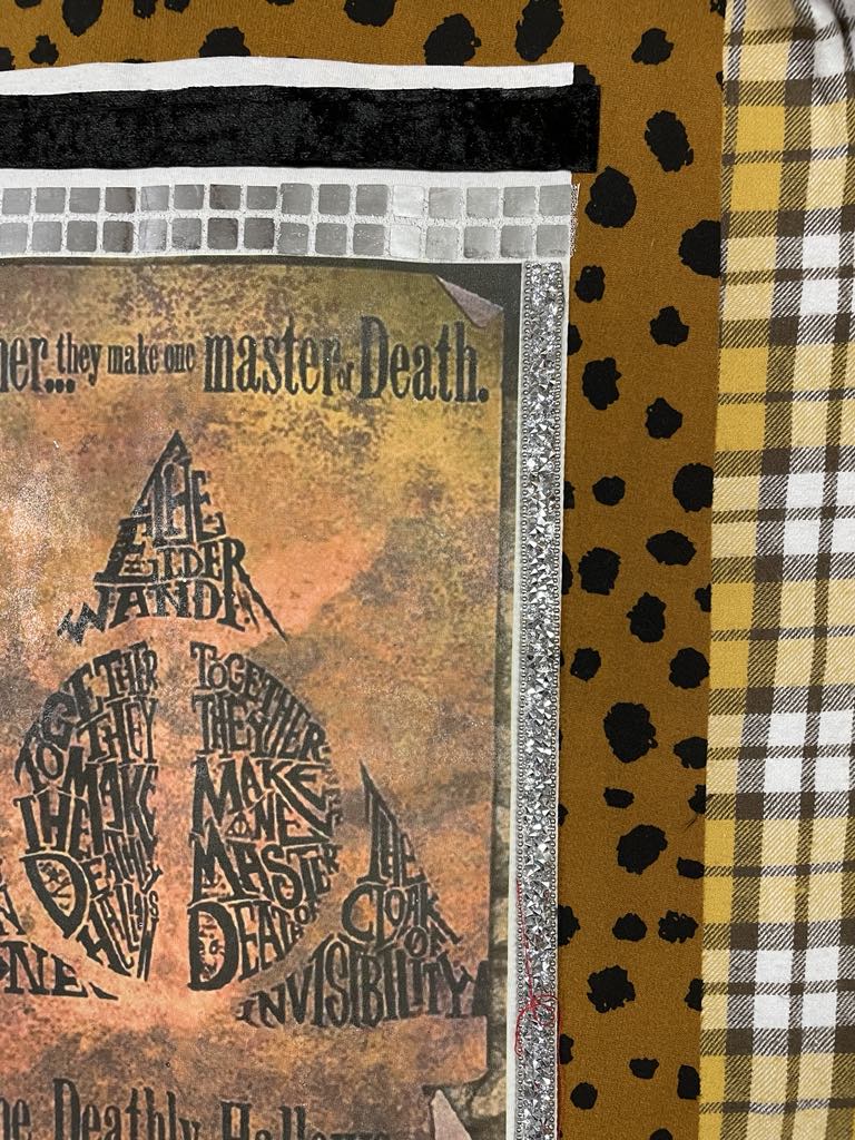 Harry's shirt - the deathly hallows