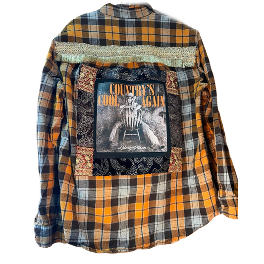 Country’s Cool Again – Lainey Wilson Gold Fringe Flannel
