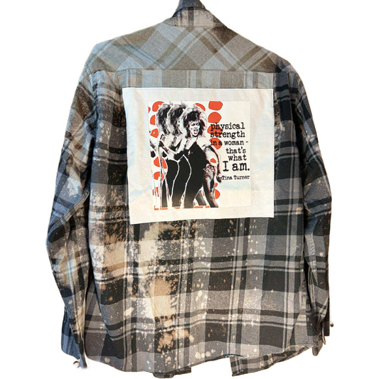 Tina Turner in black plaid “Physical Strength” Flannel